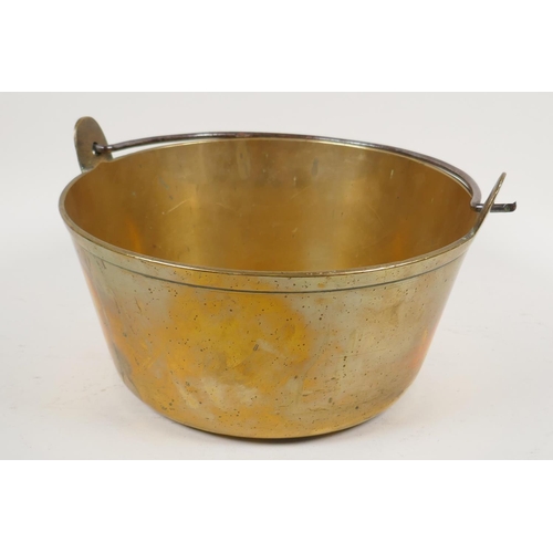 1 - A C19th brass jam pan with iron swing handle, 10