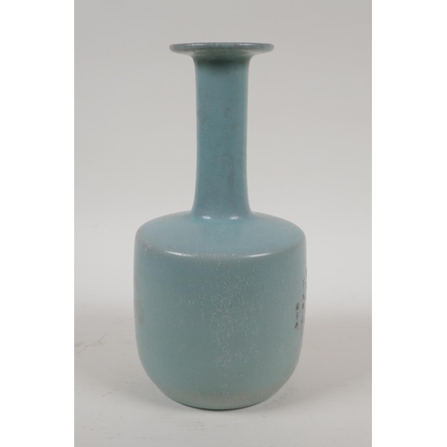45 - A Chinese Ru ware style vase with slender neck and character inscription to side, 10