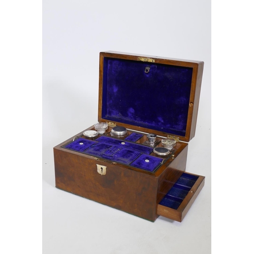 57 - A C19th walnut vanity box, with fitted interior and mirror and side drawer, 11