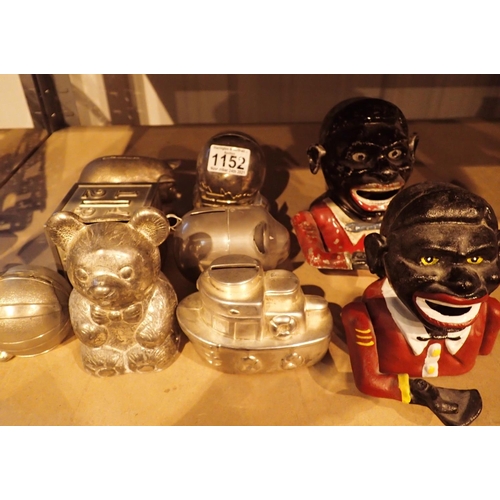 Collection of metal and cast metal vintage money boxes. Not Barnebys