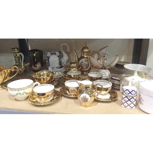 1030 - Shelf of mixed ceramics to include a tea set, floral bowl, etc. Not available for in-house P&P, cont... 