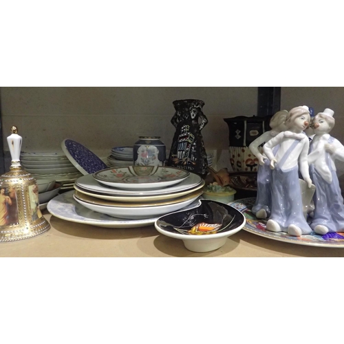 1037 - Shelf of mixed ceramics including clown figurines, display bell etc. Not available for in-house P&P,... 