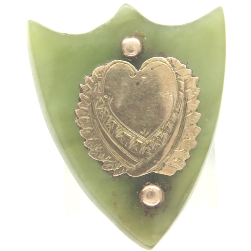 28 - 9ct rose gold and jadeite shield brooch, 20 x 24 mm. P&P Group 1 (£14+VAT for the first lot and £1+V... 