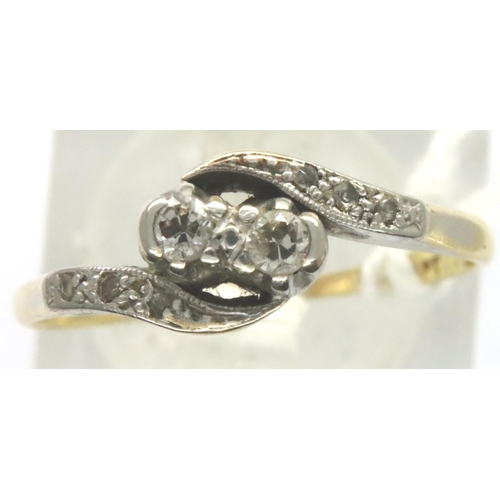 3 - 18ct gold diamond set twist ring, size N, 2.1g. P&P Group 1 (£14+VAT for the first lot and £1+VAT fo... 