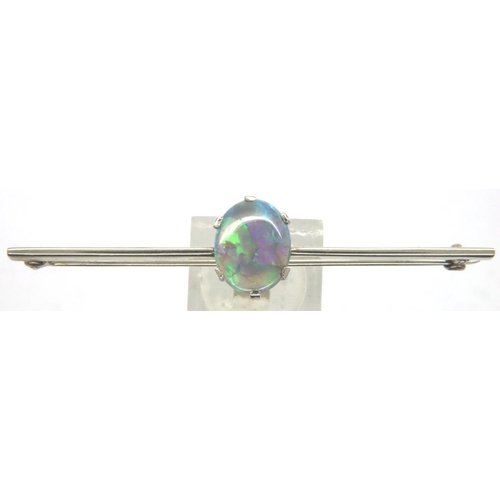 30 - Platinum and large Australian opal bar brooch, L: 65 mm, opal 13 x 10 mm, 5.4g. P&P Group 1 (£14+VAT... 