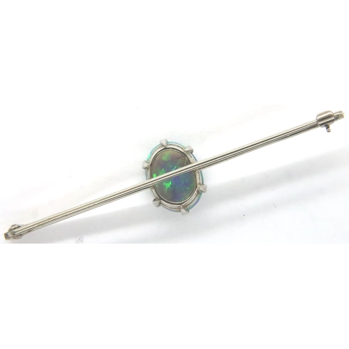 30 - Platinum and large Australian opal bar brooch, L: 65 mm, opal 13 x 10 mm, 5.4g. P&P Group 1 (£14+VAT... 