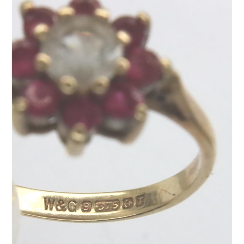 33 - 9ct gold topaz and ruby ring, size K/L, 1.8g. P&P Group 1 (£14+VAT for the first lot and £1+VAT for ... 