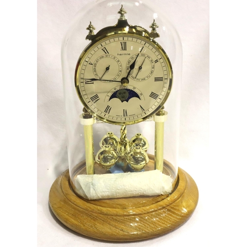 Modern Hermle anniversary clock with day and date dials and Barnebys