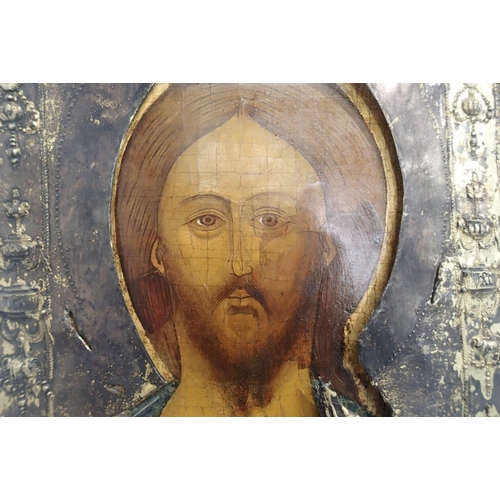 251 - Bust length icon of the Saviour circa 1600, with extensive later repair, with a fine later parcel gi... 