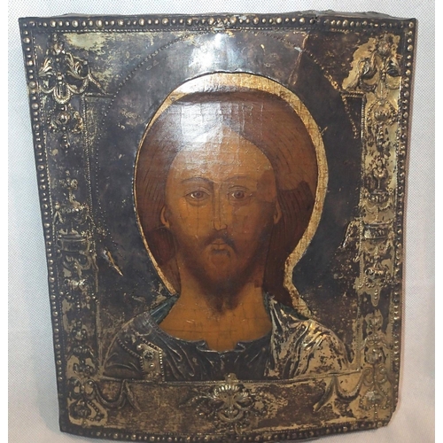 251 - Bust length icon of the Saviour circa 1600, with extensive later repair, with a fine later parcel gi... 