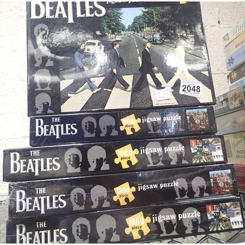 2048 - Five mixed sealed Beatles Album cover jigsaws. P&P Group 3 (£25+VAT for the first lot and £5+VAT for... 