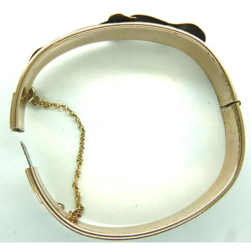 9 - Yellow metal bangle, possibly gold?, with safety chain. P&P Group 1 (£14+VAT for the first lot and £... 