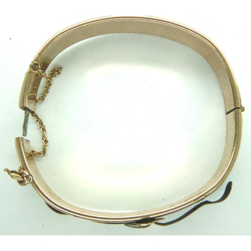 9 - Yellow metal bangle, possibly gold?, with safety chain. P&P Group 1 (£14+VAT for the first lot and £... 