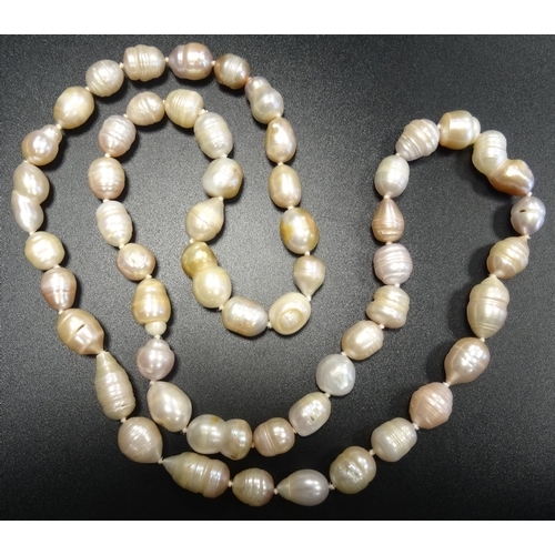 14 - BAROQUE PEARL NECKLACE
approximately 80cm long