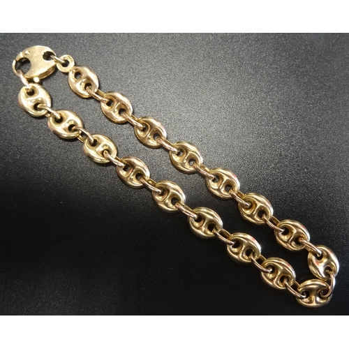 44 - NINE CARAT GOLD FANCY LINK BRACELET
by Italian designer Unoaerre, approximately 6.9 grams
