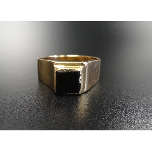 97 - EIGHTEEN CARAT GOLD SIGNET RING
set with a black agate square, total weight approximately 4.2 grams