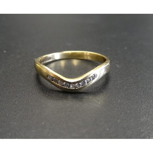 100 - CHANNEL SET DIAMOND WAVY DESIGN RING
in nine carat gold, ring size M-N