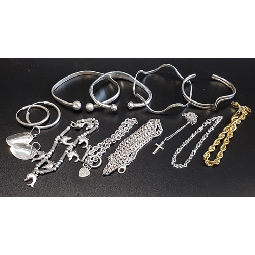 41 - SELECTION OF SILVER JEWELLERY
comprising four bangles, two with ball finials and the other two of wa... 
