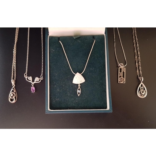 20 - FIVE SILVER PENDANTS ON SILVER CHAINS
including a boxed Oal Gorie Drift Collection pendant with blue... 
