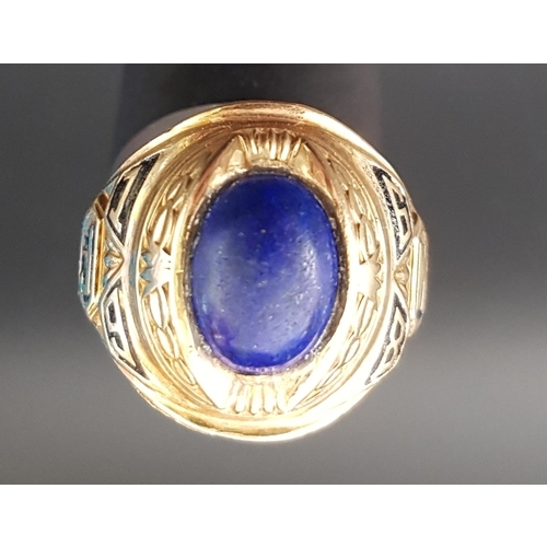 26 - TEN CARAT GOLD JOSTEN AMERICAN COLLEGE RING
the central oval blue cabochon stone flanked by J, 1 and... 