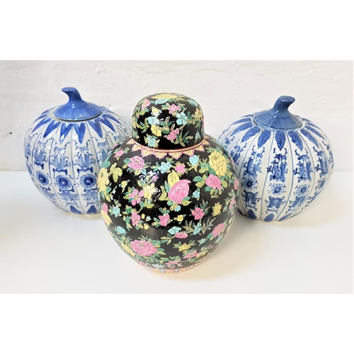 55 - PAIR OF CHINESE BLUE AND WHITE VASES
shaped as gourds with stork type lids, 27cm high, together with... 