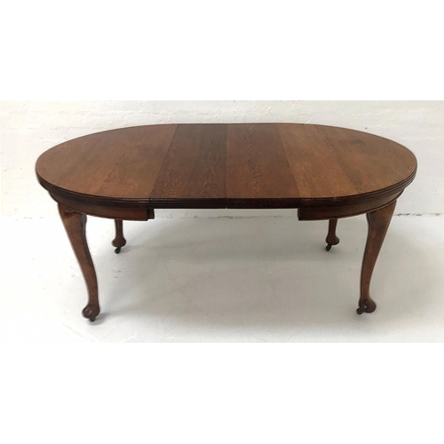 432 - EDWARDIAN OAK EXTENDING DINING TABLE
with D ends, two extra leaves and a wind out mechanism, standin... 
