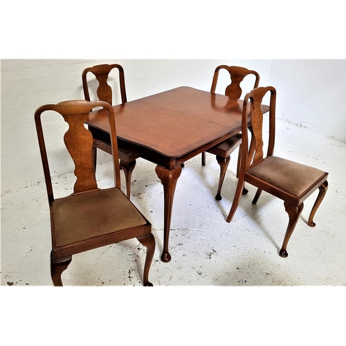 437 - BURR WALNUT AND CROSSBANDED DINING TABLE AND FOUR CHAIRS
the table with a shaped pull apart top and ... 