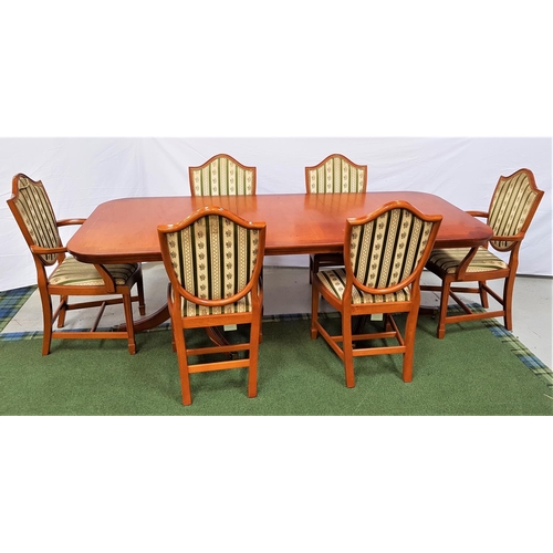 441 - YEW AND CROSSBANDED DINING TABLE AND SIX CHAIRS
the table with a rectangular top and extra leaf, sta... 