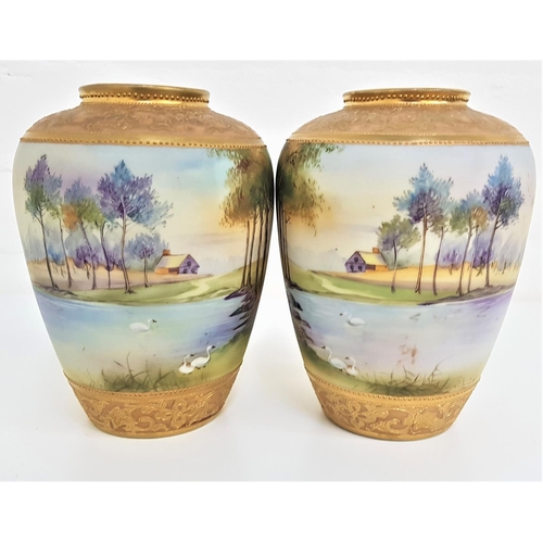 170 - PAIR OF NORITAKE VASES
the baluster vases with matching hand painted lake and landscape scenes, with... 
