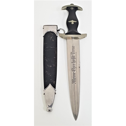 314 - GERMAN WWII SS OFFICERS DRESS DAGGER
with a black ebony handle inset with the enamel SS runes and ea... 