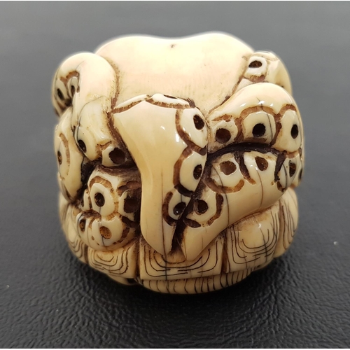 250 - IVORY NETSUKE
of a tortoise with an octopus on it's back, with character marks to base, 5.5cm long