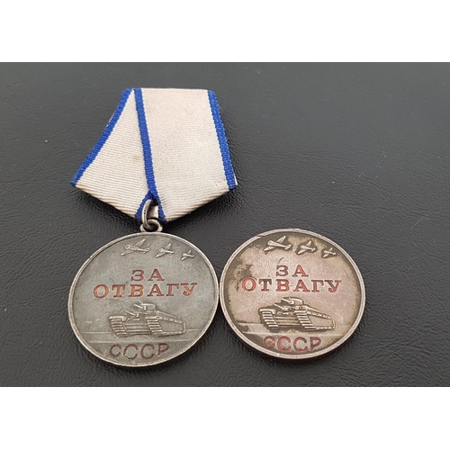 348 - SOVIET RUSSIAN MEDAL FOR COURAGE
numbered to the back 1535280, with ribbon and another medal numbere... 