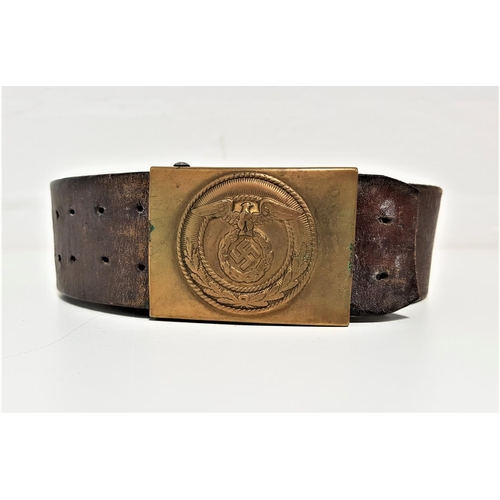 317 - GERMAN THIRD REICH SA BELT BUCKLE
on a leather adjustable original belt, the brass buckle with an ea... 