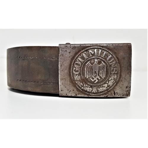 318 - GERMAN BELT BUCKLE
marked Gott Mitt Uns around an eagle and swastika on an original leather belt, im... 