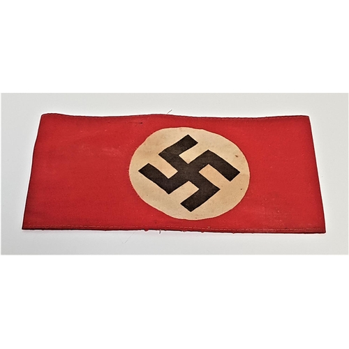 322 - GERMAN THIRD REICH NSDAP PARTY ARMBAND
the red cotton armband with a printed swastika to the centre