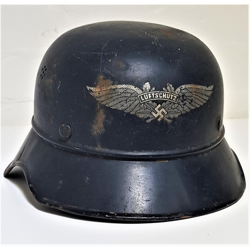 325 - GERMAN WWII LUFTSCHUTZ HELMET
with original transfer, leather adjustable liner and chin strap, marke... 