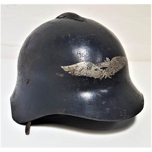 326 - GERMAN WWII LUFTSCHUTZ HELMET
Russian made for the German Army, with original transfer, leather adju... 