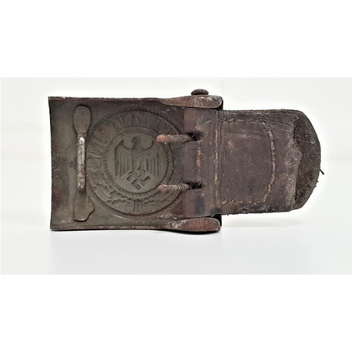 315 - GERMAN WWII BELT BUCKLE
marked Gott Mitt Uns around an eagle and swastika, with leather toggle