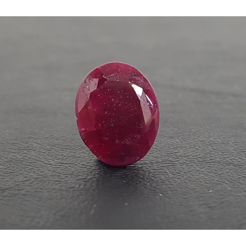 131 - CERTIFIED LOOSE NATURAL RUBY 
the oval cut ruby weighing 13.55cts, with IDT Gem Testing Report