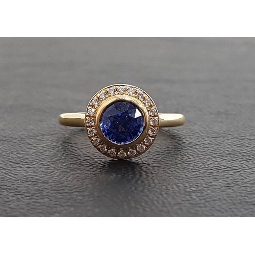 34 - IMPRESSIVE SAPPHIRE AND DIAMOND CLUSTER RING
the central bezel set round cut sapphire approximately ... 
