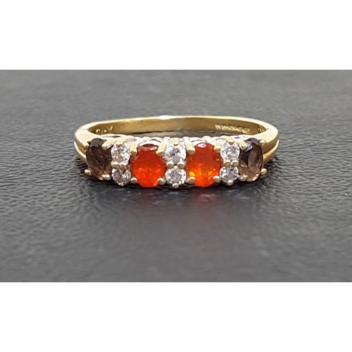 118 - DIAMOND AND GEM SET RING
the two central fire opals and two outer smoky quartz stones separated by s... 
