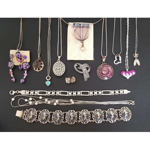 40 - GOOD SELECTION OF SILVER JEWELLERY
including a Siamese niello bracelet, the oval links depicting dan... 