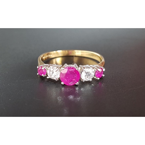 107 - GRADUATED RUBY AND DIAMOND FIVE STONE RING
the central round cut ruby approximately 0.5cts flanked b... 