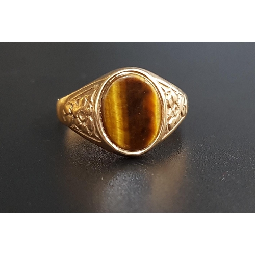 127 - TIGER'S EYE RING
on nine carat gold shank, ring size M-N