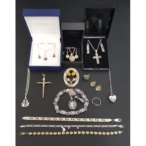 136 - SELECTION OF SILVER JEWELLERY
comprising three suites of jewellery, all with a pair of earrings and ... 
