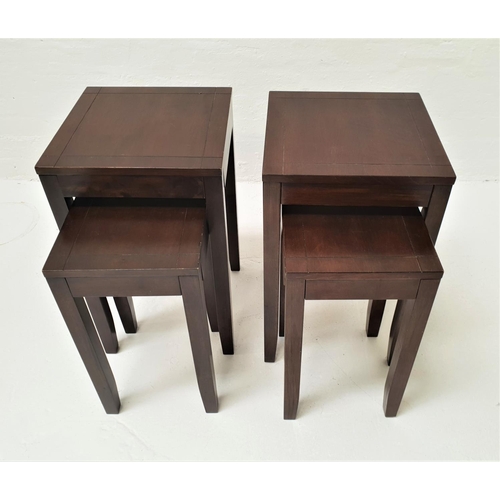 411 - TWO PAIRS OF TEAK OCCASIONAL TABLES
all with square tops, standing on shaped supports, 64xm wide