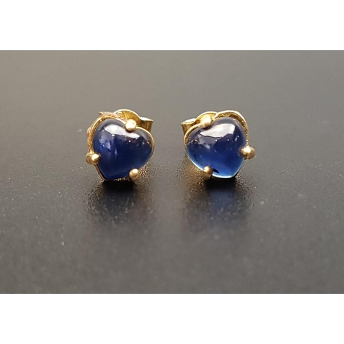 140 - PAIR OF SAPPHIRE STUD EARRINGS
the heart shaped cabochon sapphires in unmarked gold, the butterflies... 