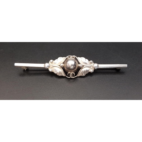 141 - GEORG JENSEN DANISH SILVER BROOCH
pattern number 224B, with a half bead centre and foliate surround,... 