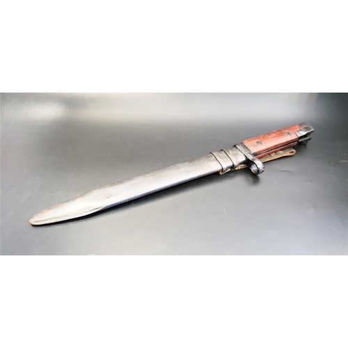 330 - ITALIAN BAYONET
with wood grip and fullered 24.5cm blade, with a metal scabbard