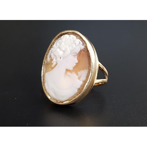 76 - LARGE CAMEO DRESS RING
the oval cameo depicting a female bust in profile, on nine carat gold shank, ... 